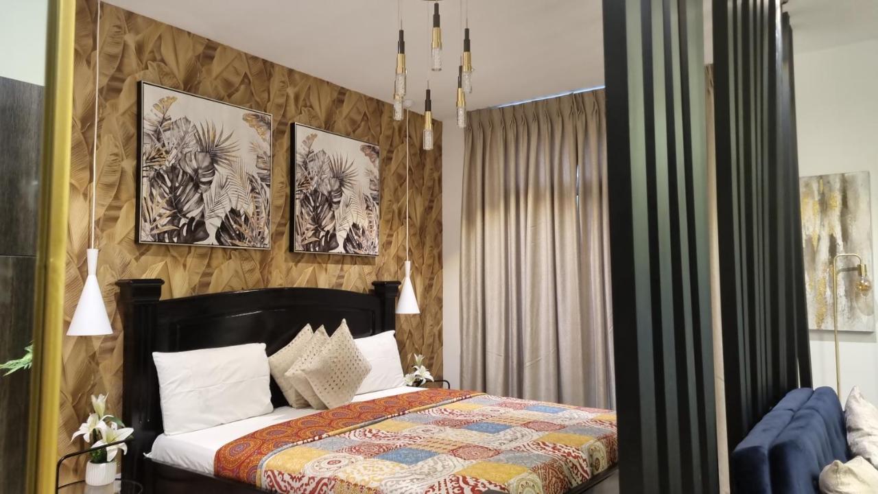 Embassy Gardens Luxury Suites Cpg Акра Екстериор снимка
