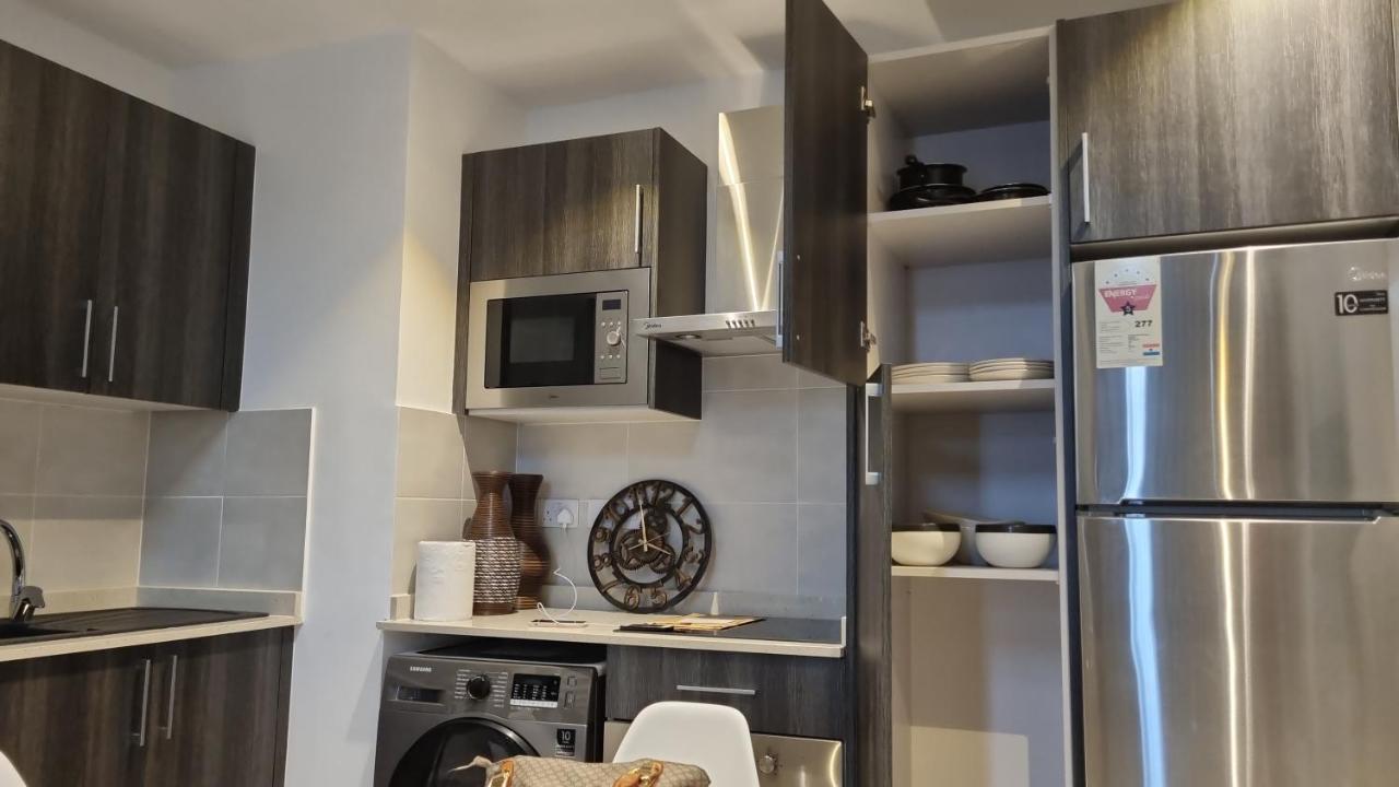 Embassy Gardens Luxury Suites Cpg Акра Екстериор снимка
