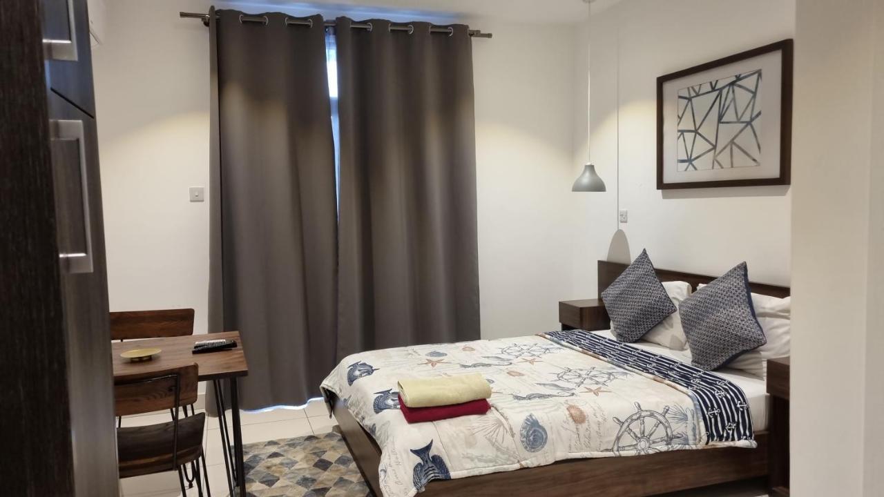 Embassy Gardens Luxury Suites Cpg Акра Екстериор снимка