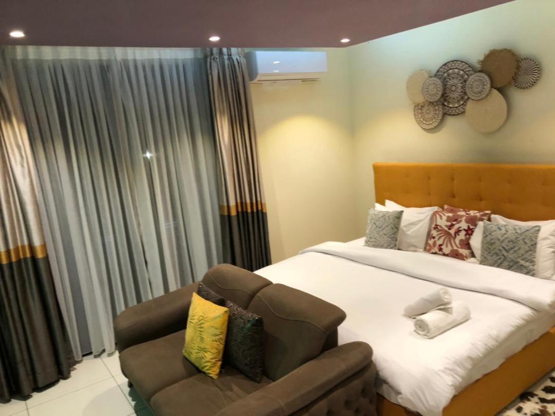 Embassy Gardens Luxury Suites Cpg Акра Екстериор снимка
