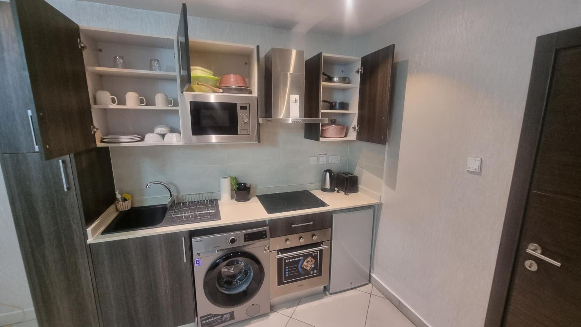 Embassy Gardens Luxury Suites Cpg Акра Екстериор снимка